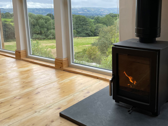 Woodburner with views of In the Hills holiday cottage